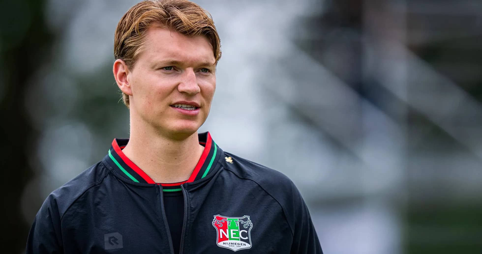 Player in NEC Nijmegen training jacket during session