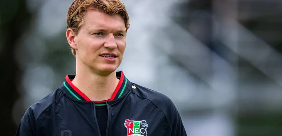 Player in NEC Nijmegen training jacket during session
