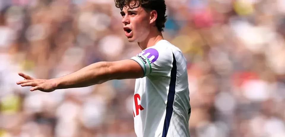 Player gesturing during a football match on field