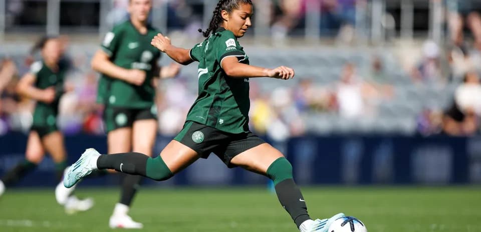 Player kicking the ball during NWSL match