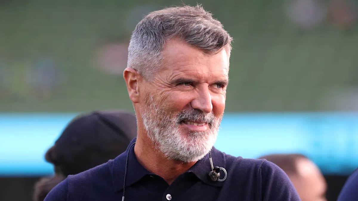 Man with a beard smiling at event