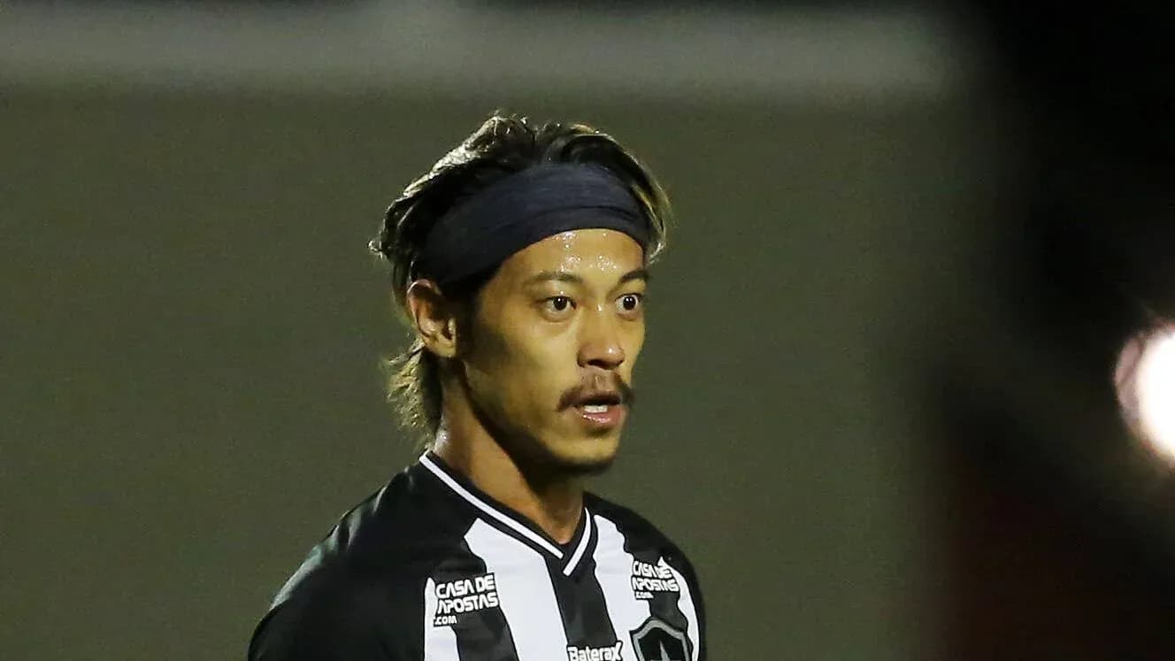 Player in black and white kit during match