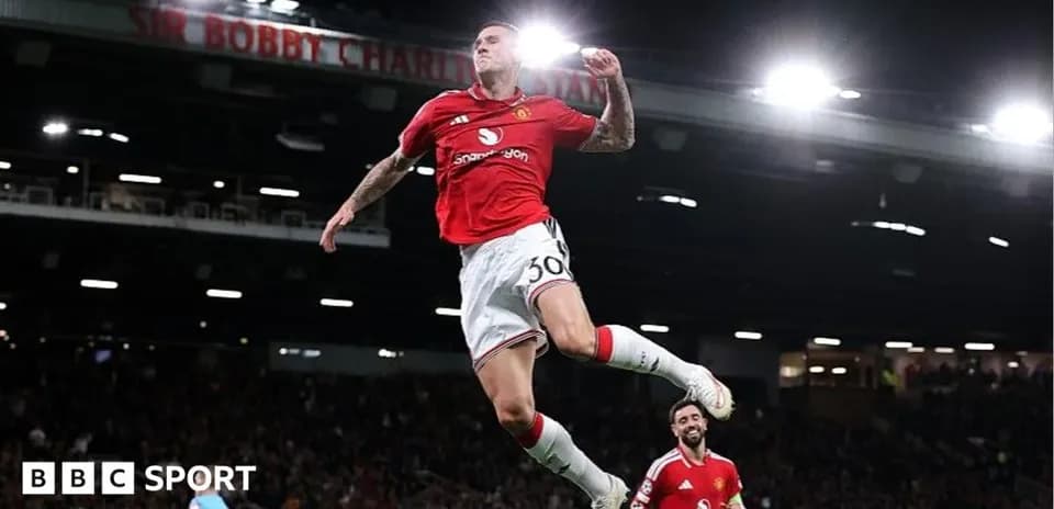 Player celebrating goal during match at Old Trafford