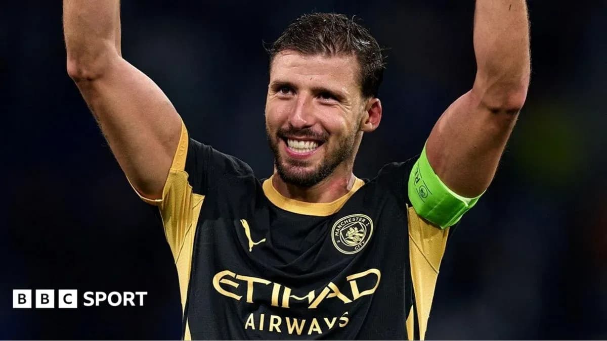 Player celebrating with arms raised after match