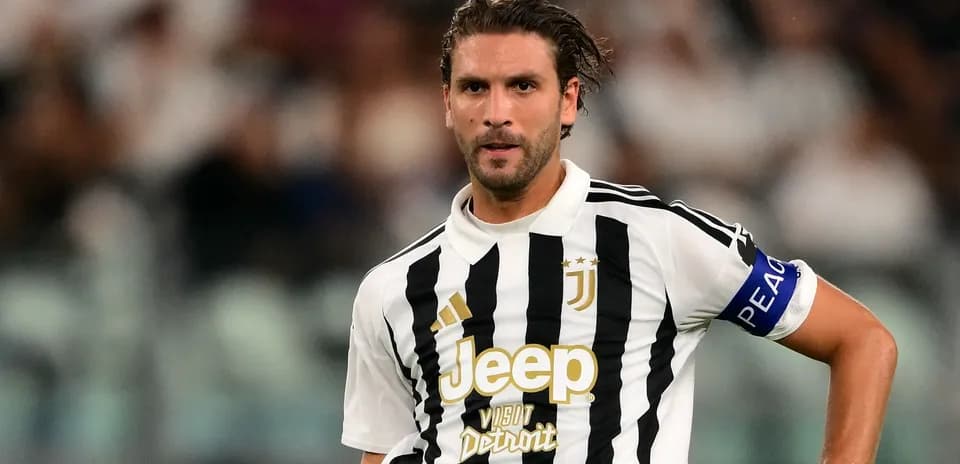 Juventus player in striped jersey on field