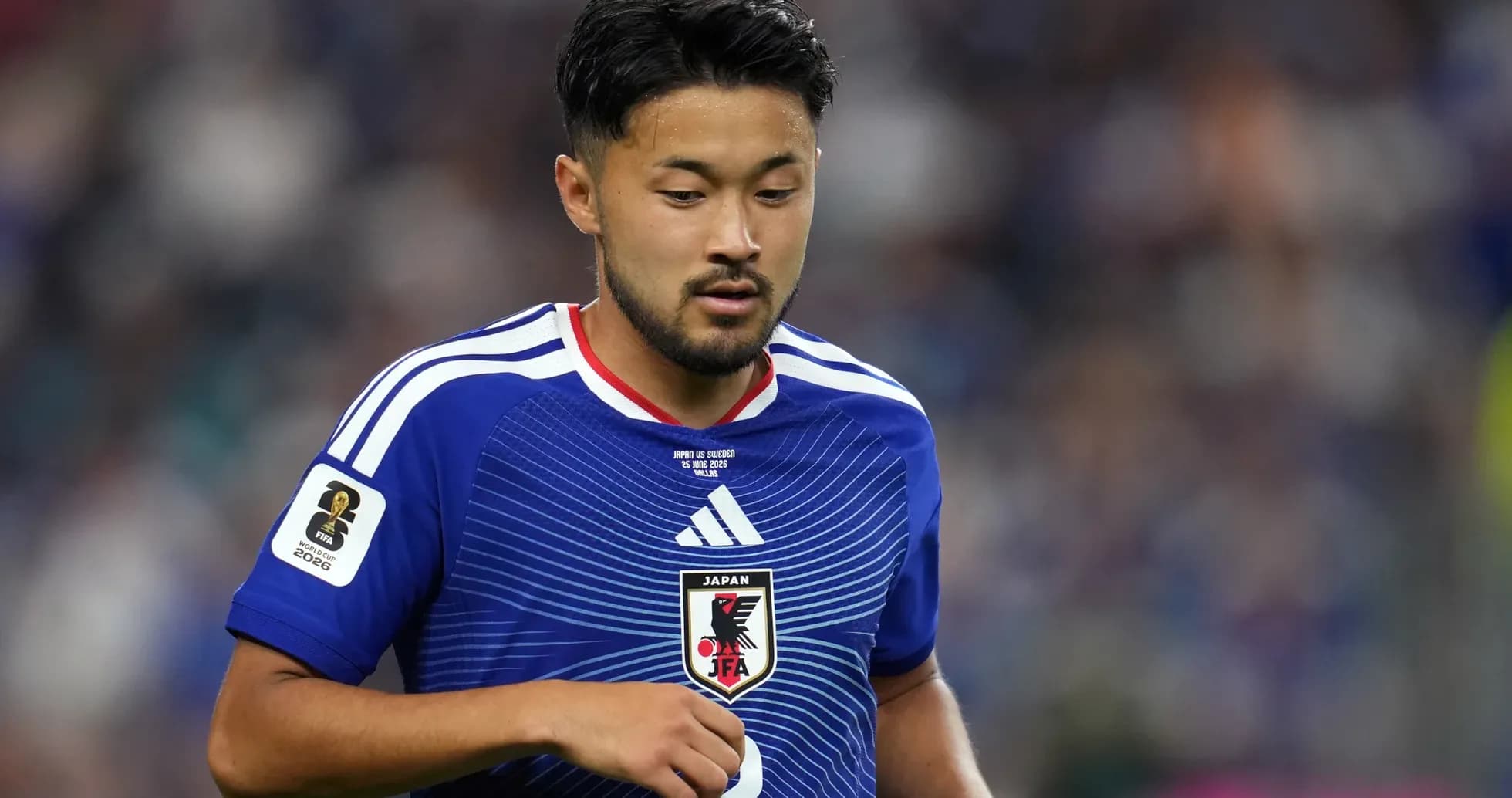 Player in Japan national team jersey during match