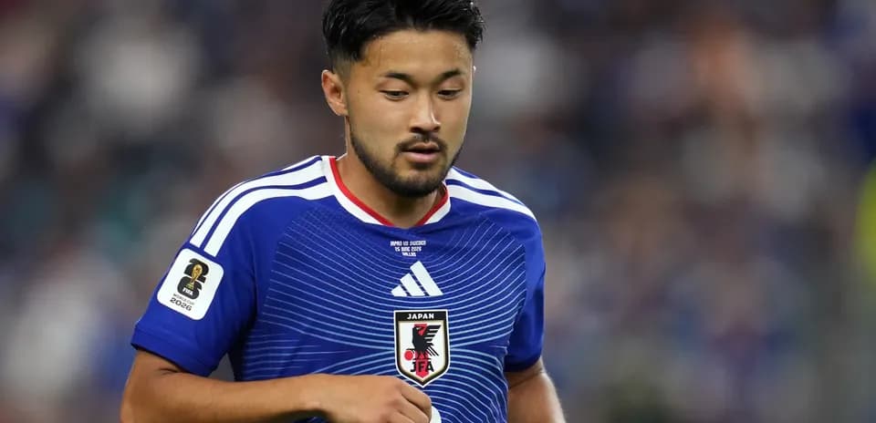 Player in Japan national team jersey during match