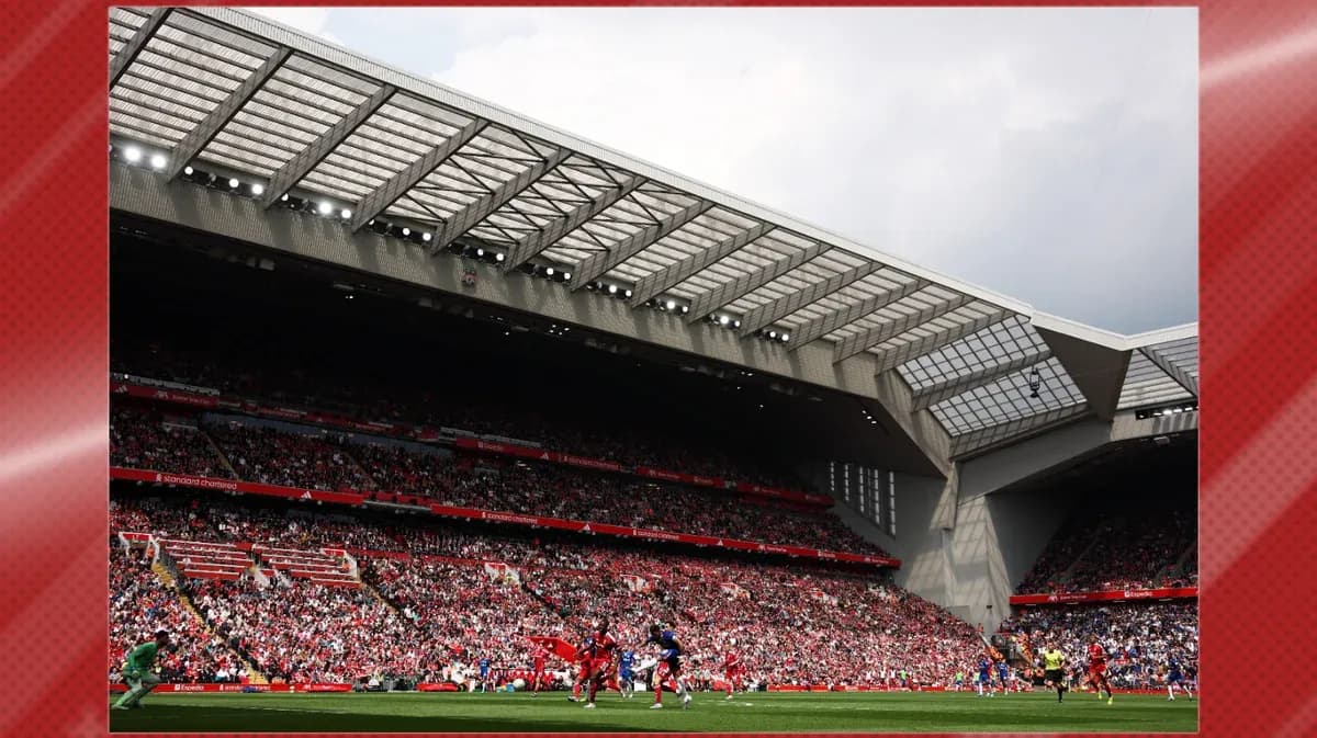 Crowd watching match at Anfield stadium