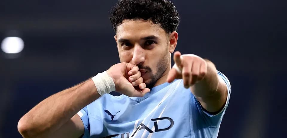 Player celebrating and pointing during a match