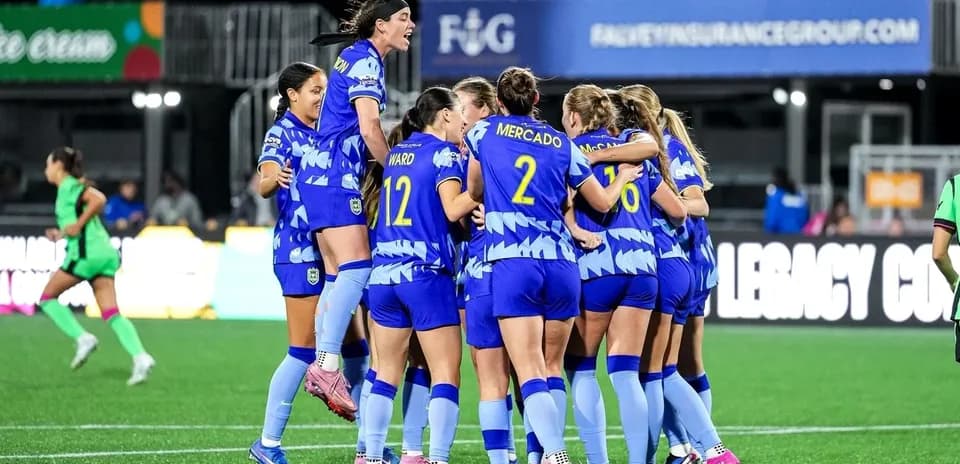 Boston Legacy W players celebrating a goal