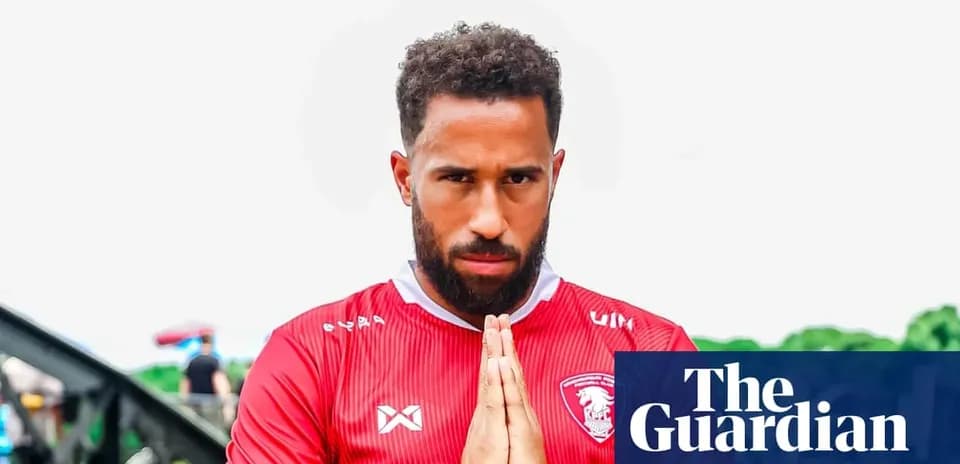 Player posing with hands together in prayer gesture