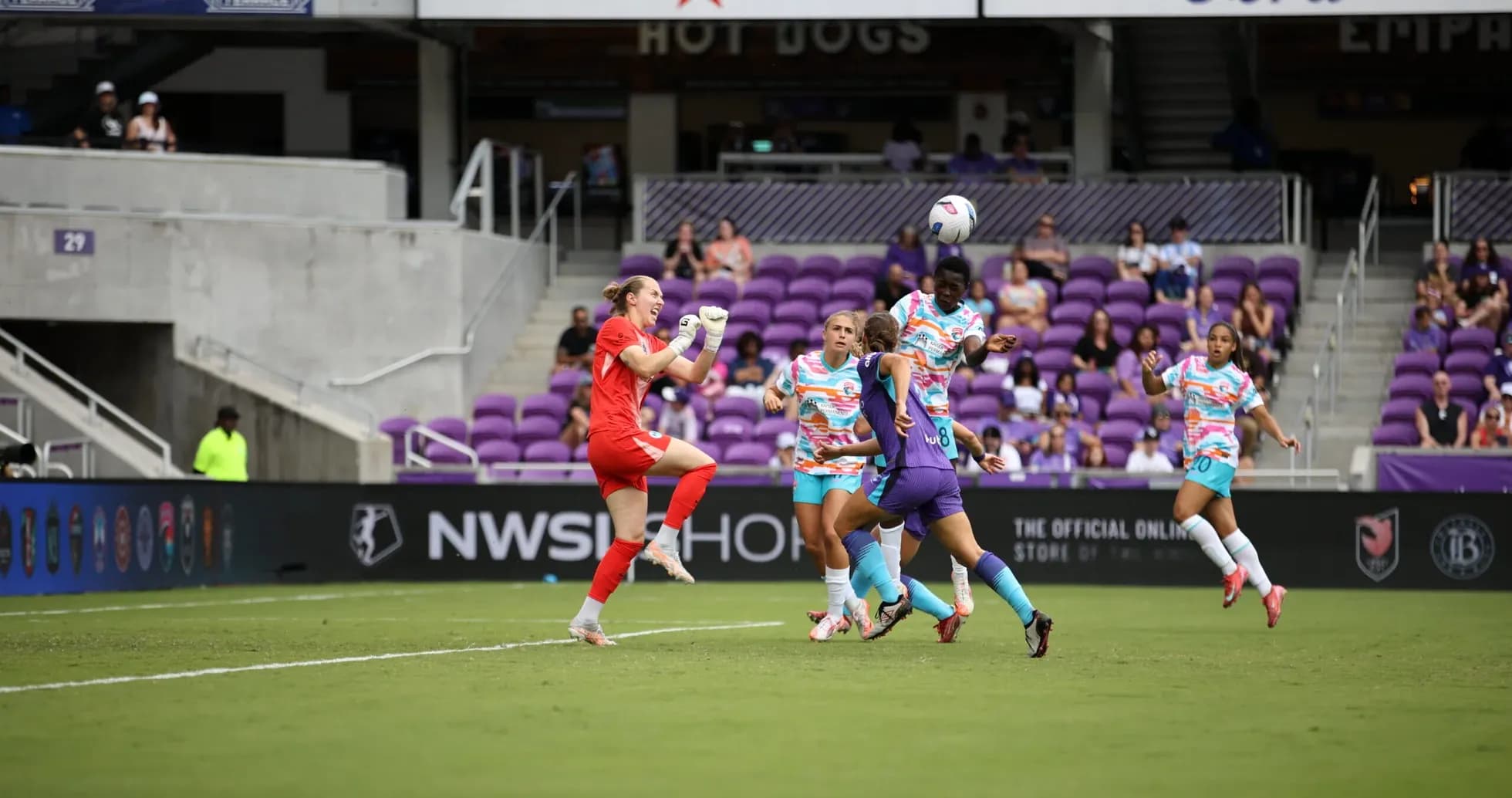Goalkeeper making a save during NWSL match