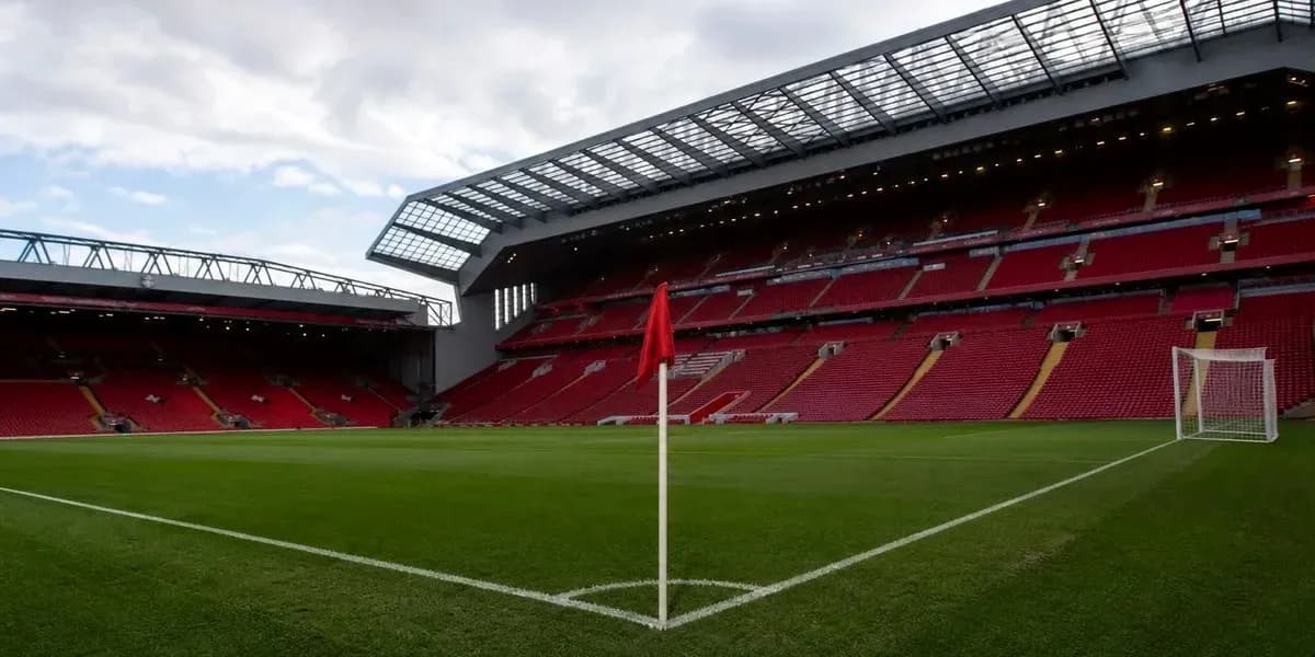 Corner flag in empty football stadium with seating