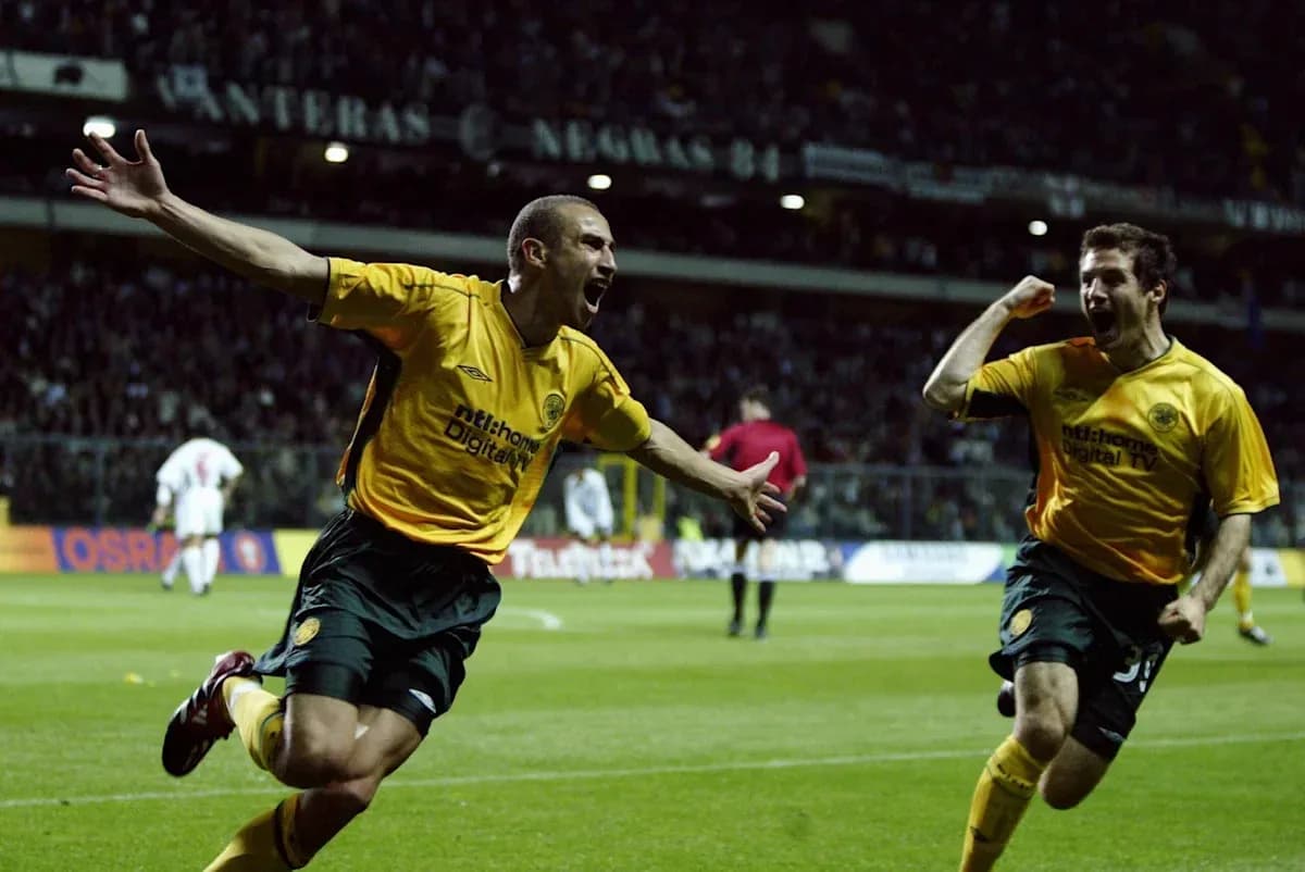 Players celebrating a goal on the pitch