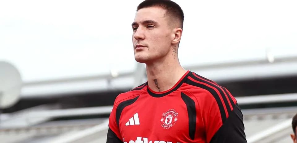 Player wearing Manchester United training kit outdoors