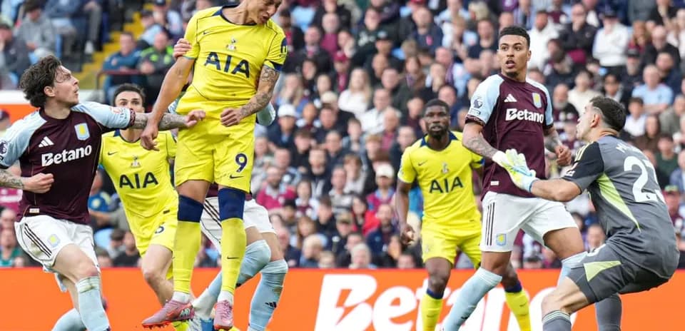 Players contesting a header during Tottenham vs Aston Villa