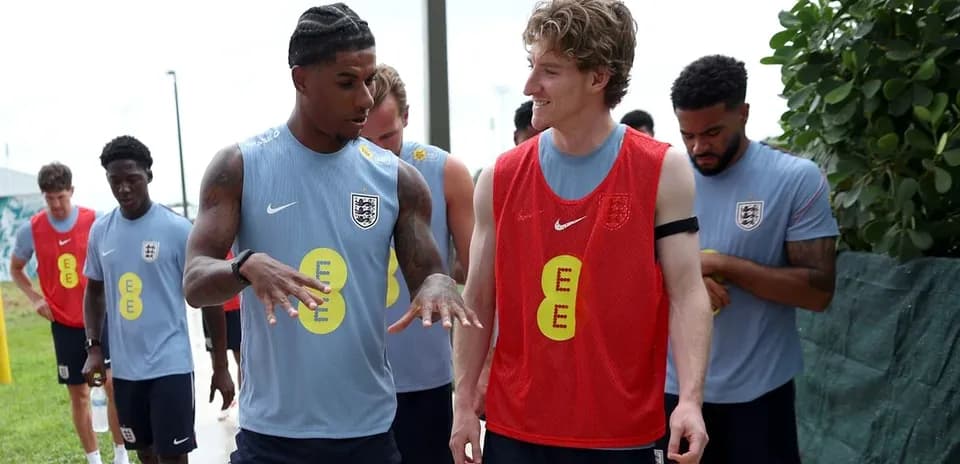 Two players discussing during England training session