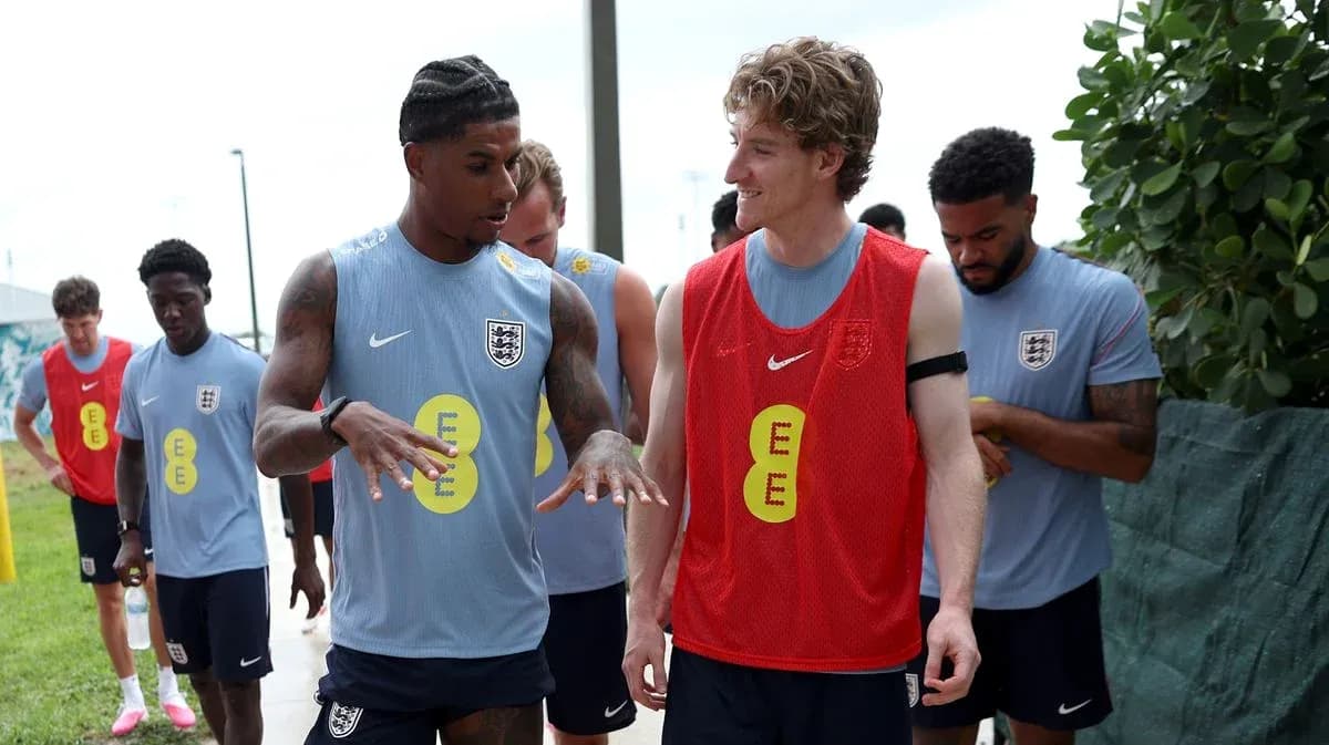 Two players discussing during England training session