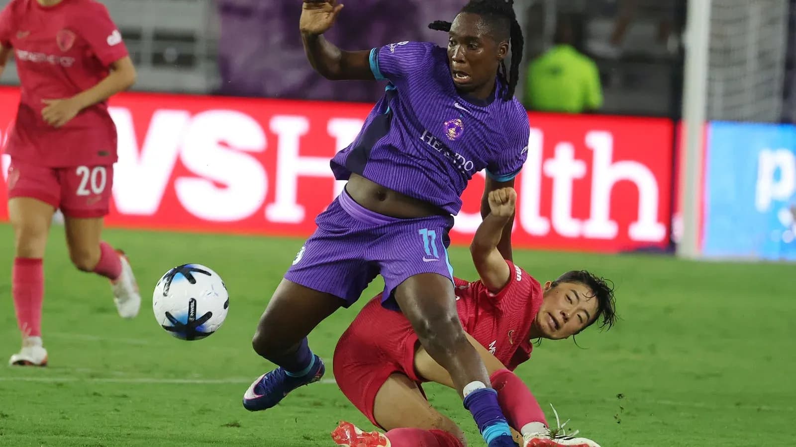 Orlando Pride player in action against North Carolina Courage