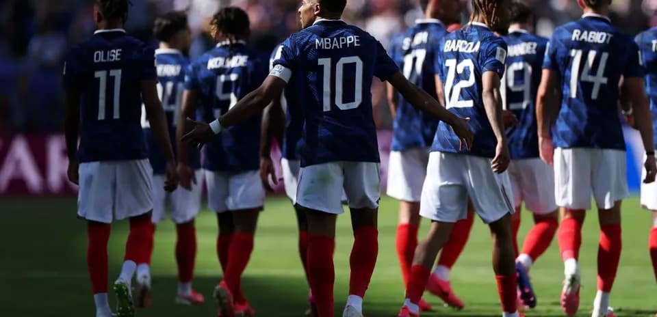 French national team players walking on the field