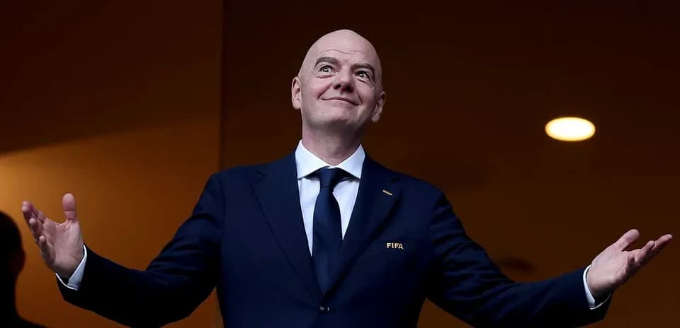 FIFA president gesturing during an event