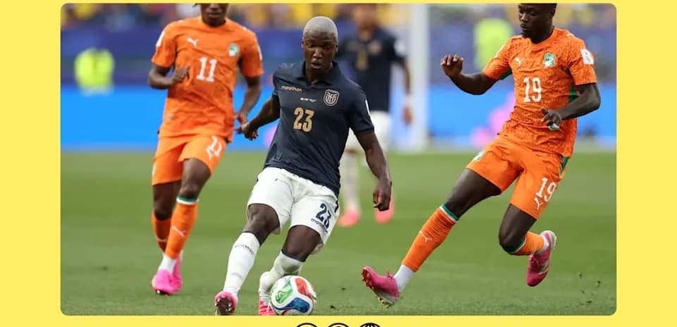 Player 23 dribbling the ball against two defenders