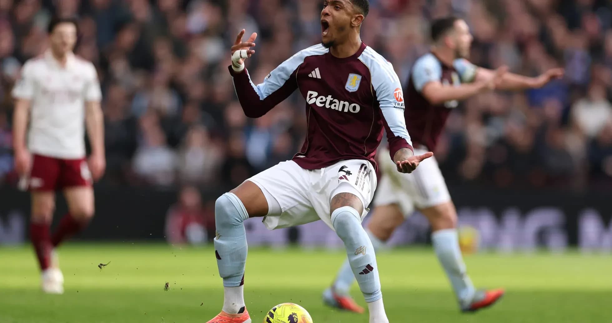 Aston Villa player celebrating during match