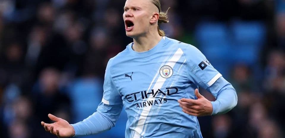 Player in light blue jersey gesturing during match