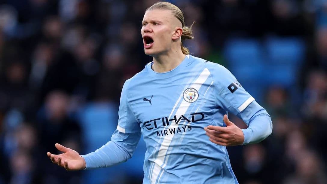 Player in light blue jersey gesturing during match