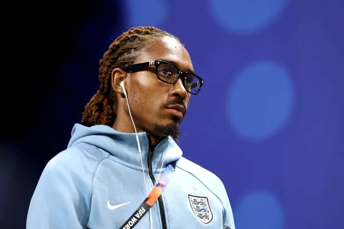 Player wearing glasses and headphones during event