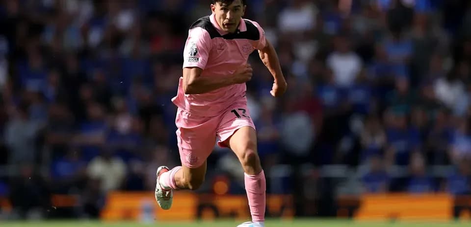 Player sprinting with ball during a match