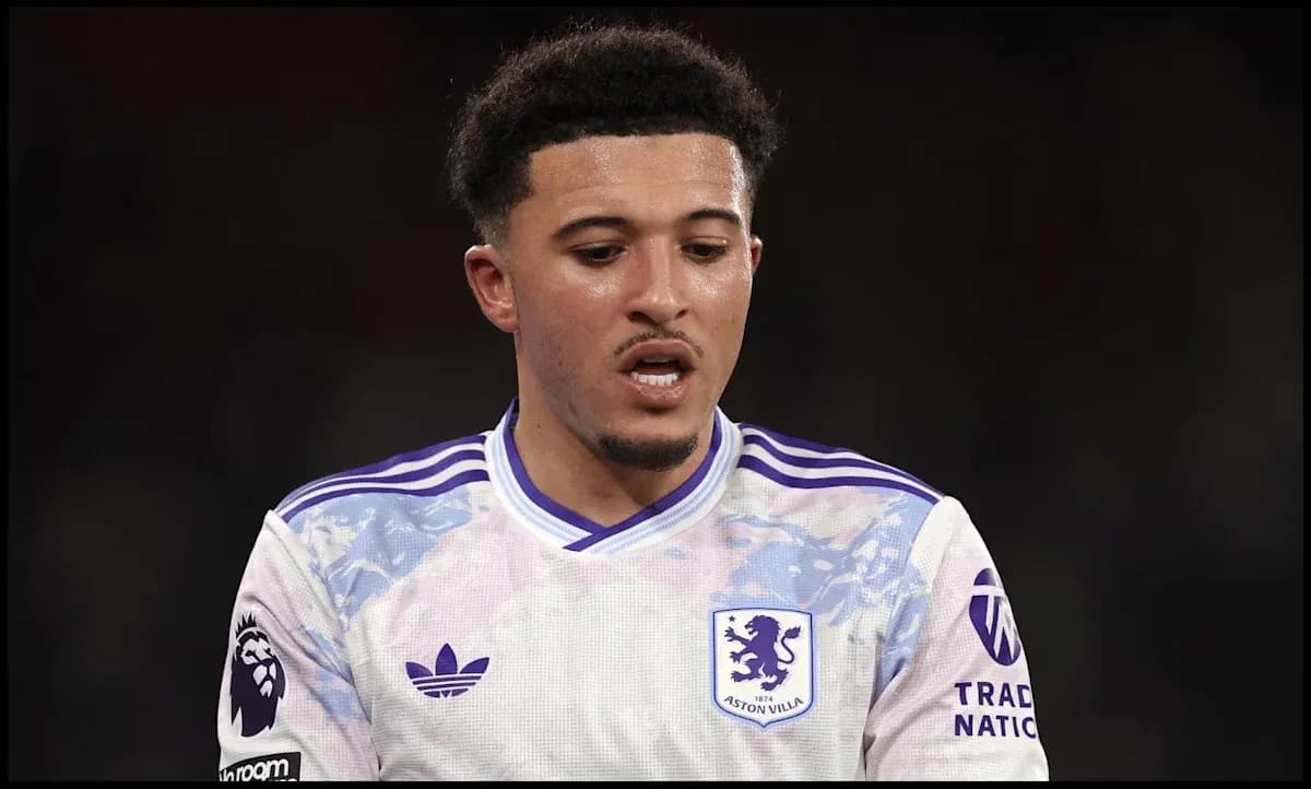 Aston Villa player during a match, focused expression