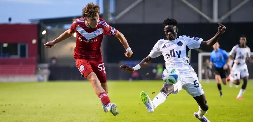 Crown Legacy player tackling Chicago Fire II opponent
