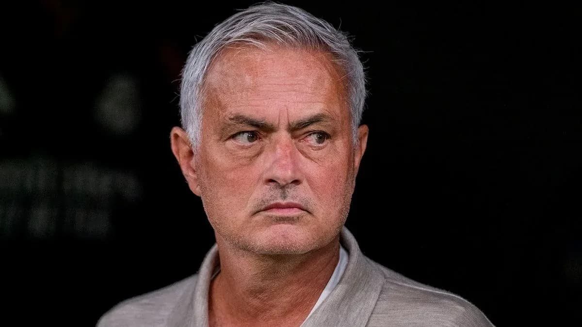 Football manager observing from the sidelines