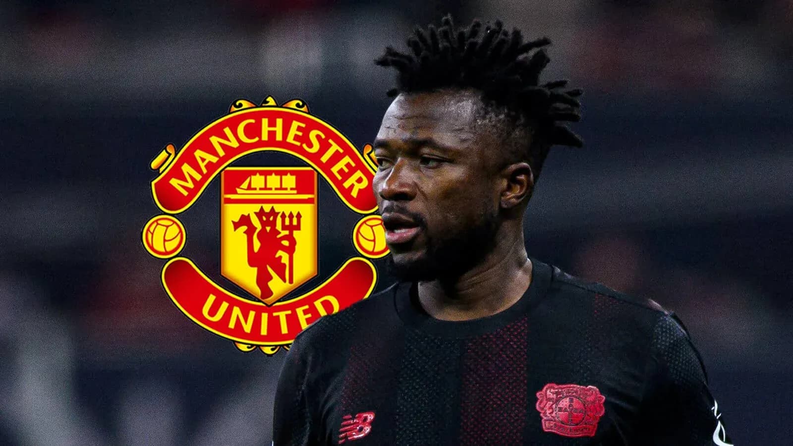 Player in black kit with Manchester United logo background