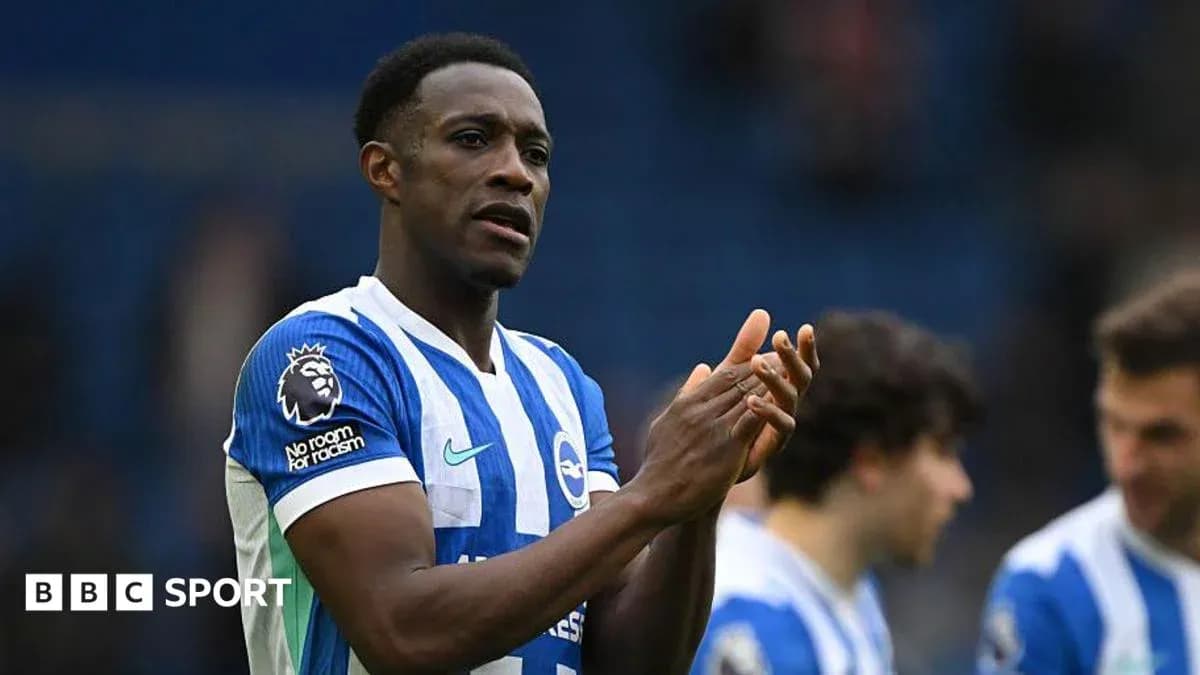 Player applauding fans after a match