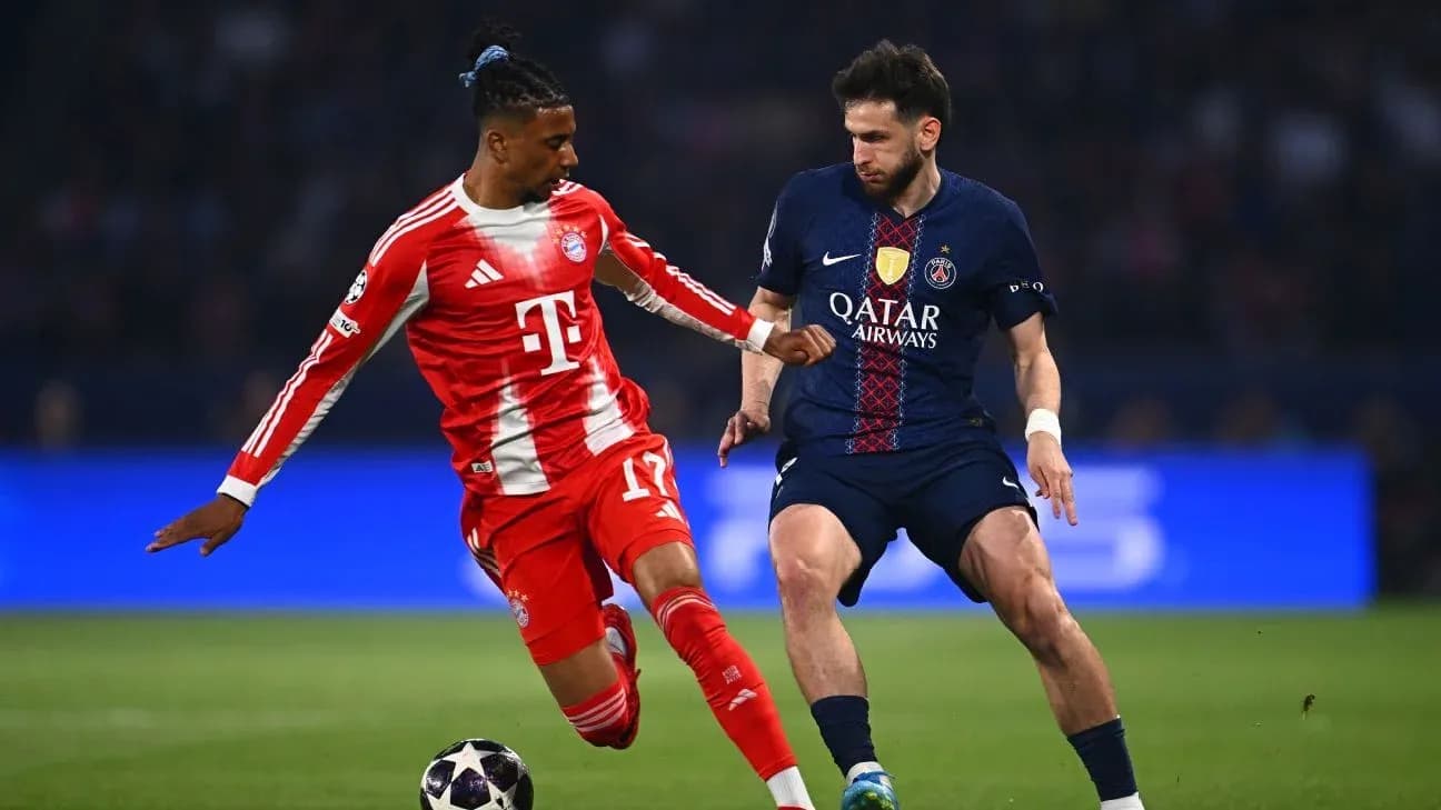 Bayern player tackling PSG opponent in match