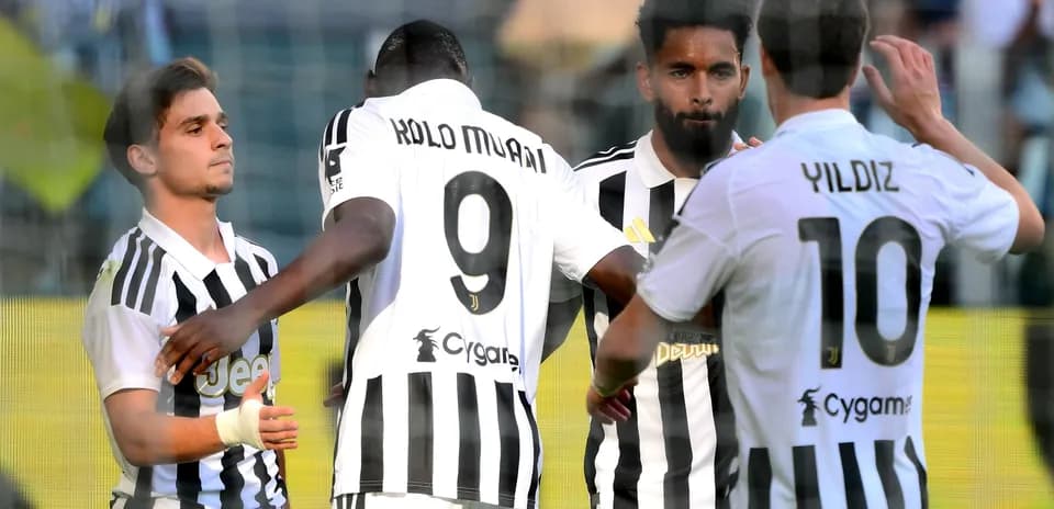 Juventus players celebrating a goal on the field