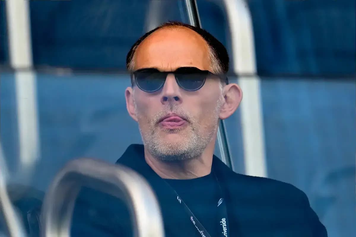 Man wearing sunglasses in a viewing area