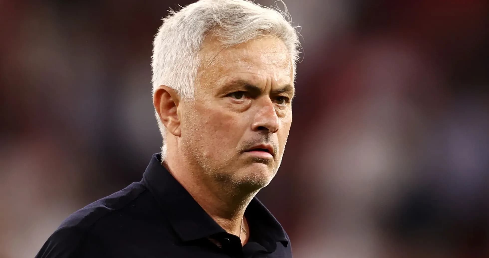 Manager observing the match from the sidelines