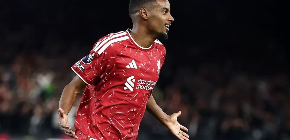 Player celebrating goal in Liverpool kit