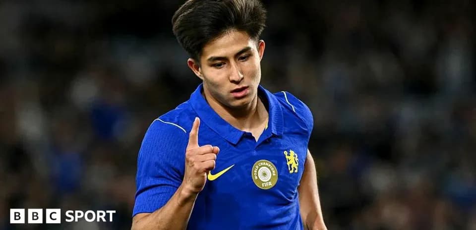 Player celebrating a goal in blue jersey
