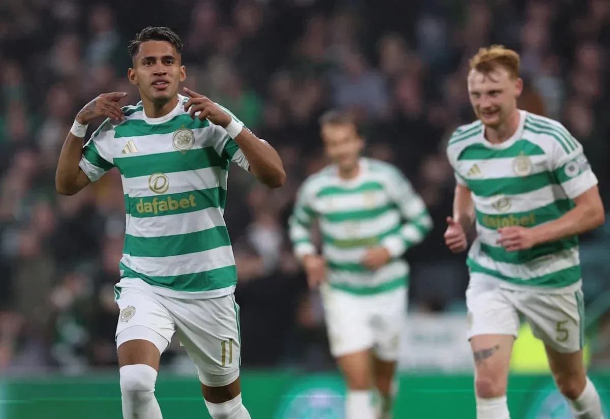Celtic players celebrating a goal during match