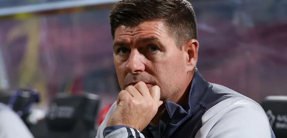 Coach observing match from the sidelines