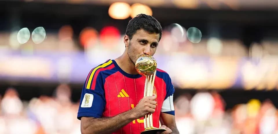 Player kissing trophy after winning tournament