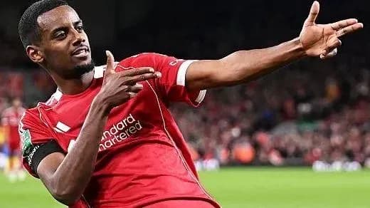 Player celebrating goal in Liverpool jersey