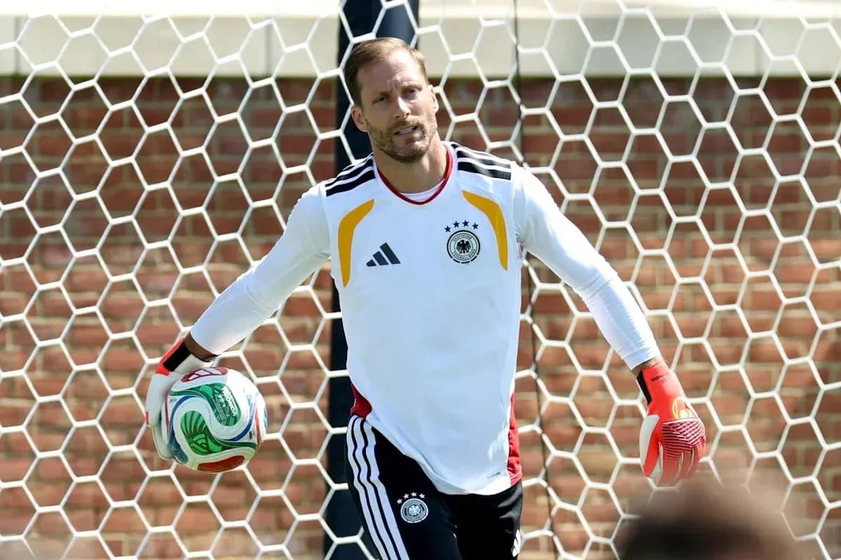 Goalkeeper holding a soccer ball during training