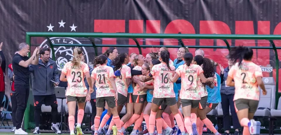 Portland Thorns players celebrating a goal