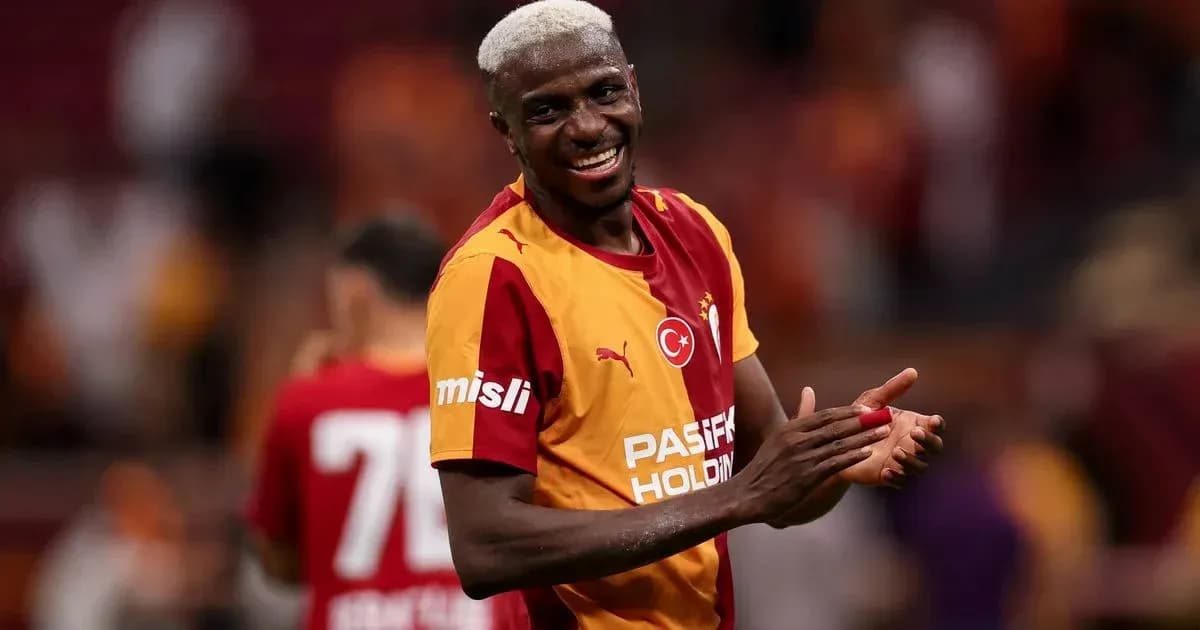 Player celebrating in Galatasaray jersey on field