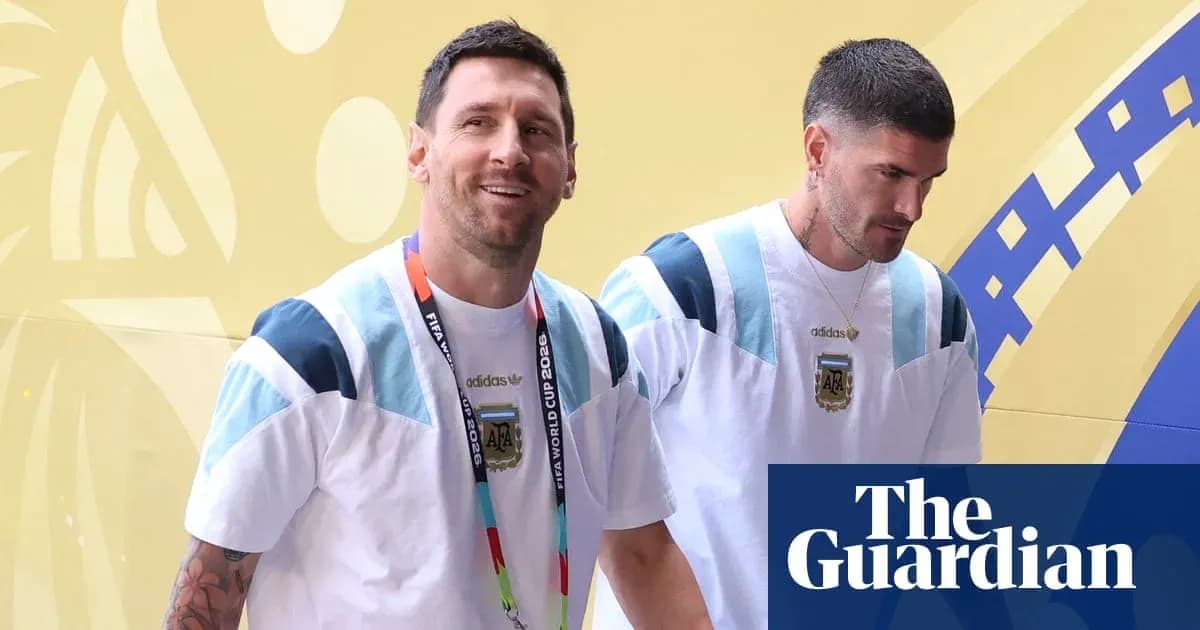 Two players walking in Argentina team apparel